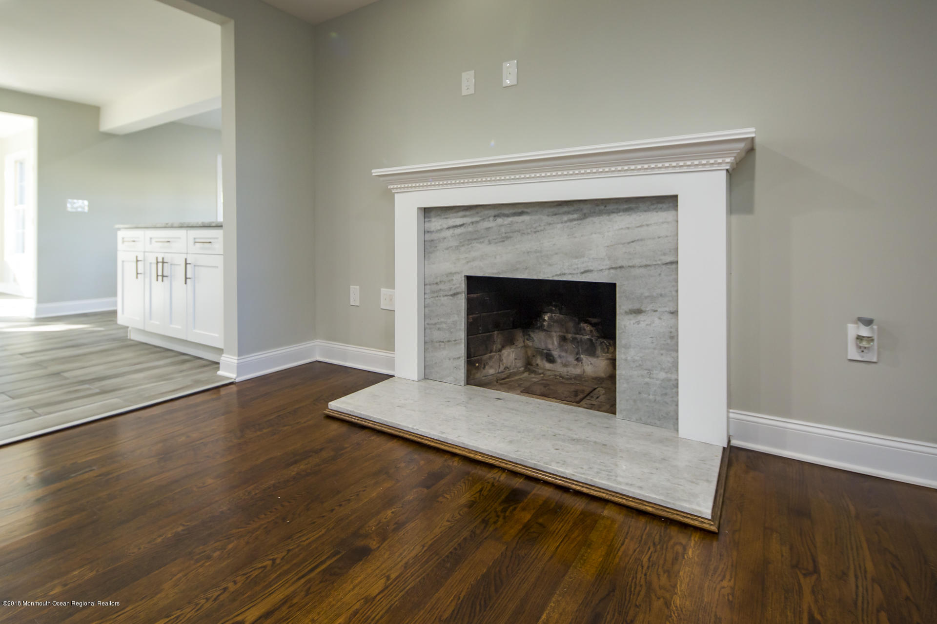 584 Colts Neck Road Freehold, NJ 07728 - Photo 5 of 29 a living room with a fireplace