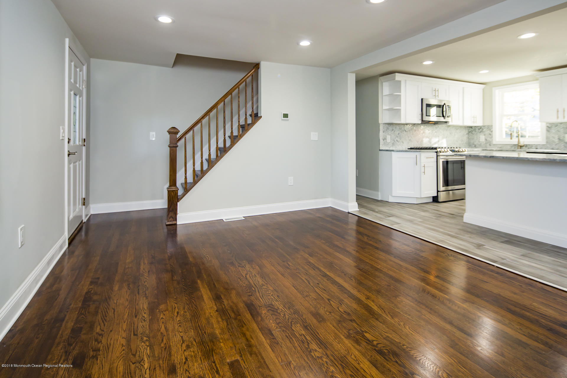 584 Colts Neck Road Freehold, NJ 07728 - Photo 6 of 29 a view of kitchen with cabinets and wooden floor