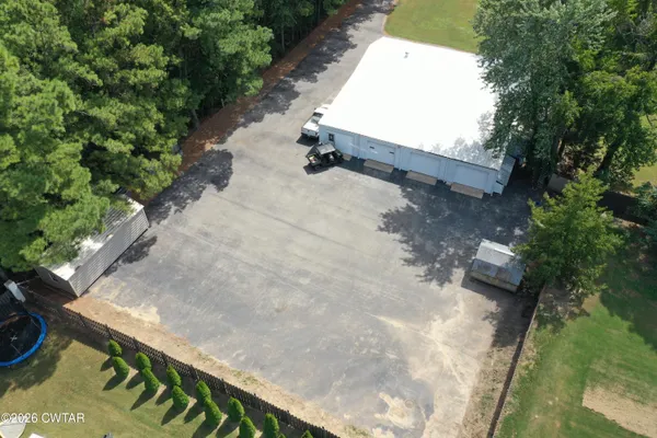 a view of a back yard of the house
