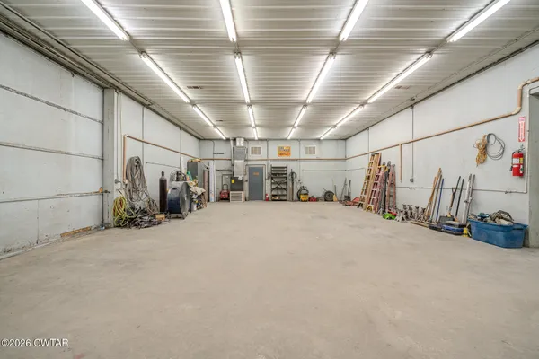 a view of a empty room with storage