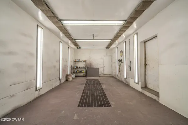 a view of a hallway with closet area