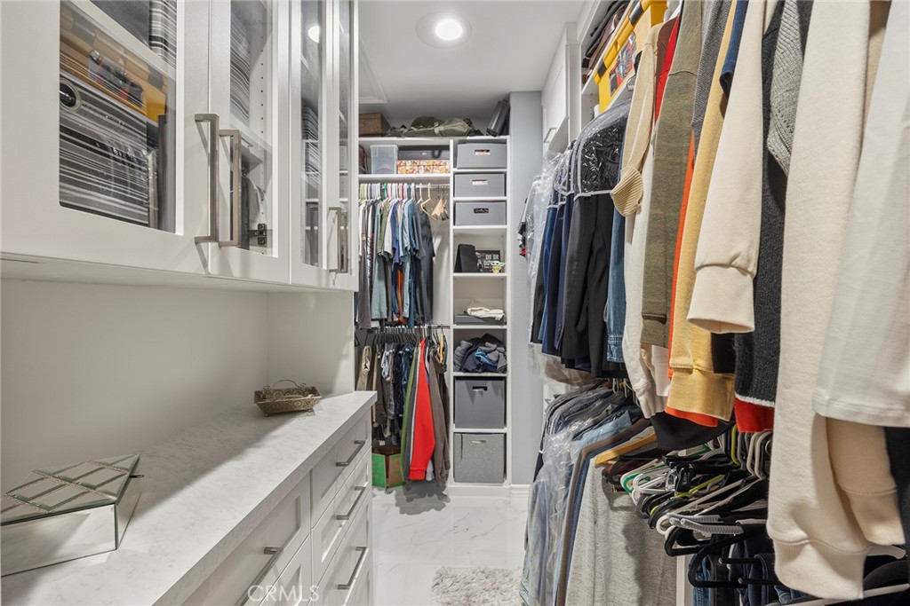 16 Kempton Lane Ladera Ranch, CA 92694 - Photo 41 of 60 Primary bedroom closet with built-ins.