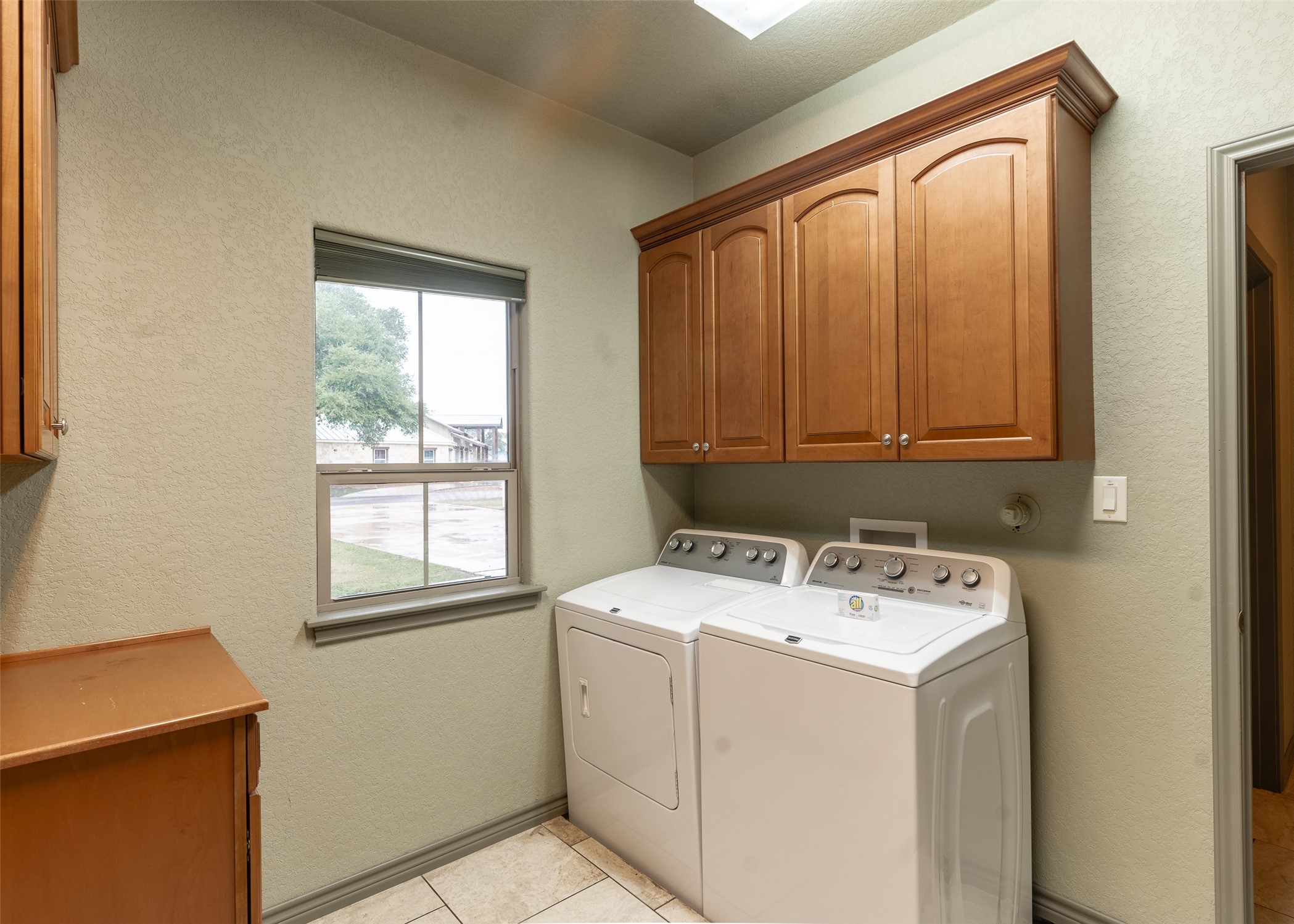 72 Stepping Stone Lane Concan, TX 78838 - Photo 15 of 25 a utility room with dryer and washer