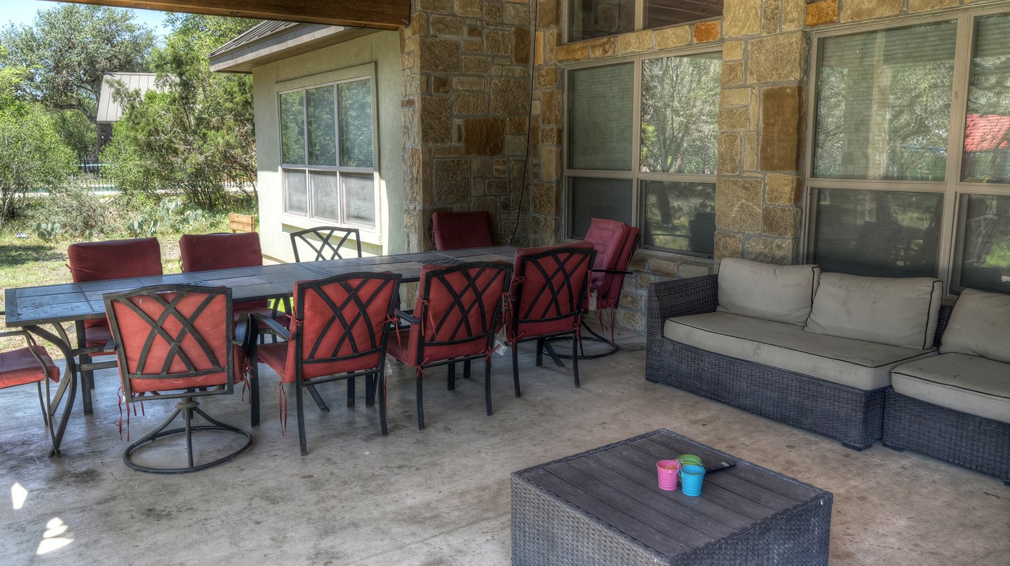 72 Stepping Stone Lane Concan, TX 78838 - Photo 23 of 25 a dining room with furniture and a potted plant