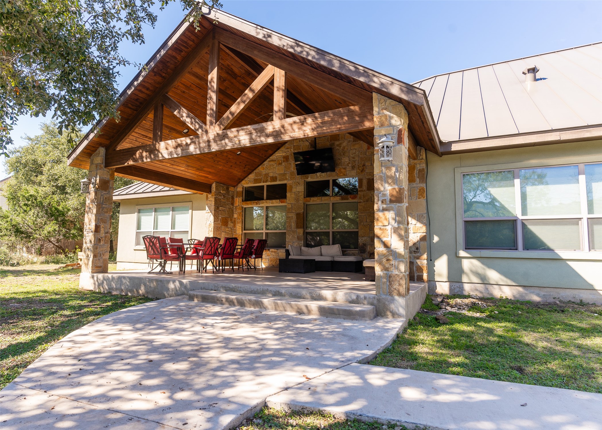72 Stepping Stone Lane Concan, TX 78838 - Photo 4 of 25 a view of a house with a patio