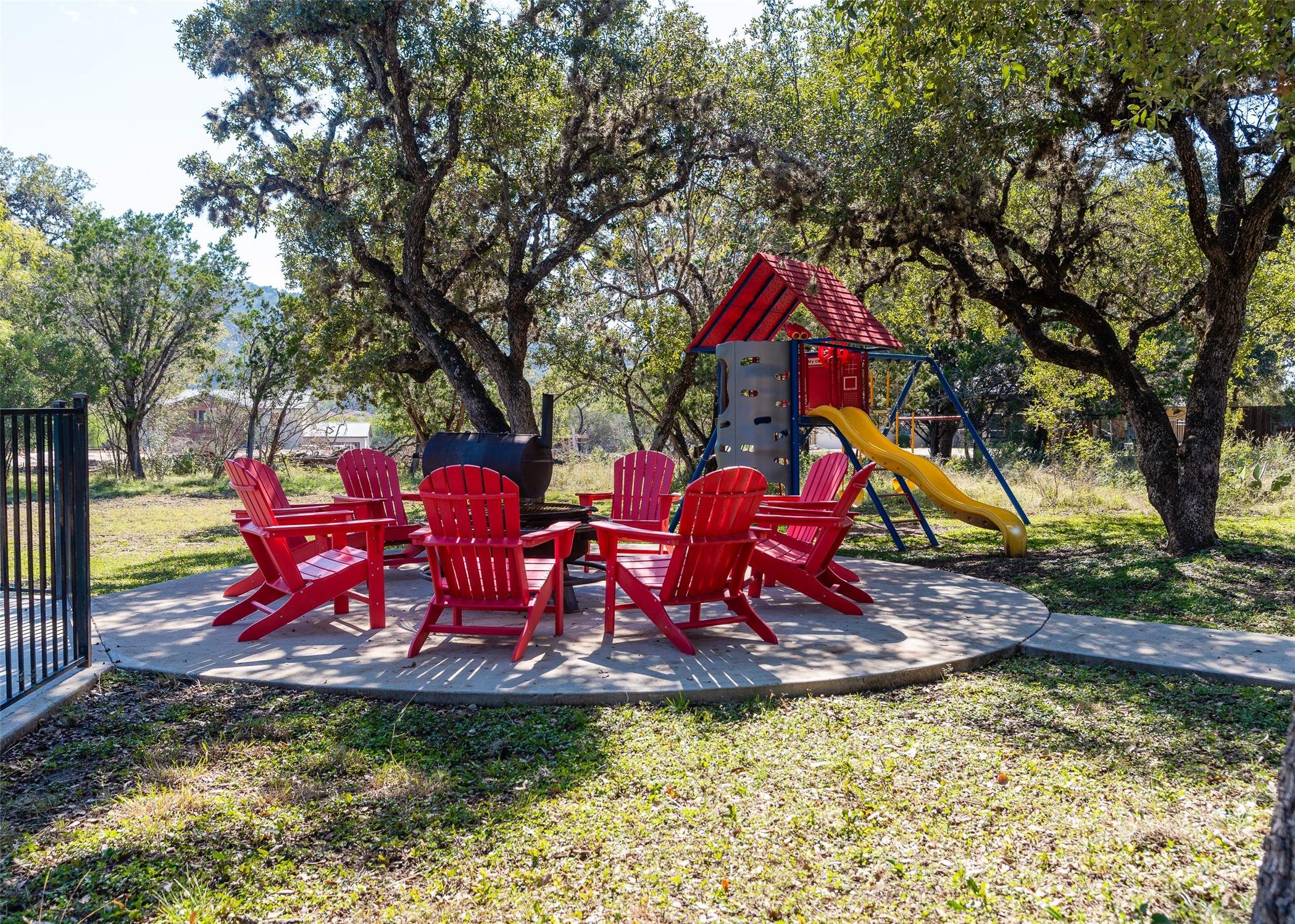 72 Stepping Stone Lane Concan, TX 78838 - Photo 5 of 25 a view of swimming pool with red chairs