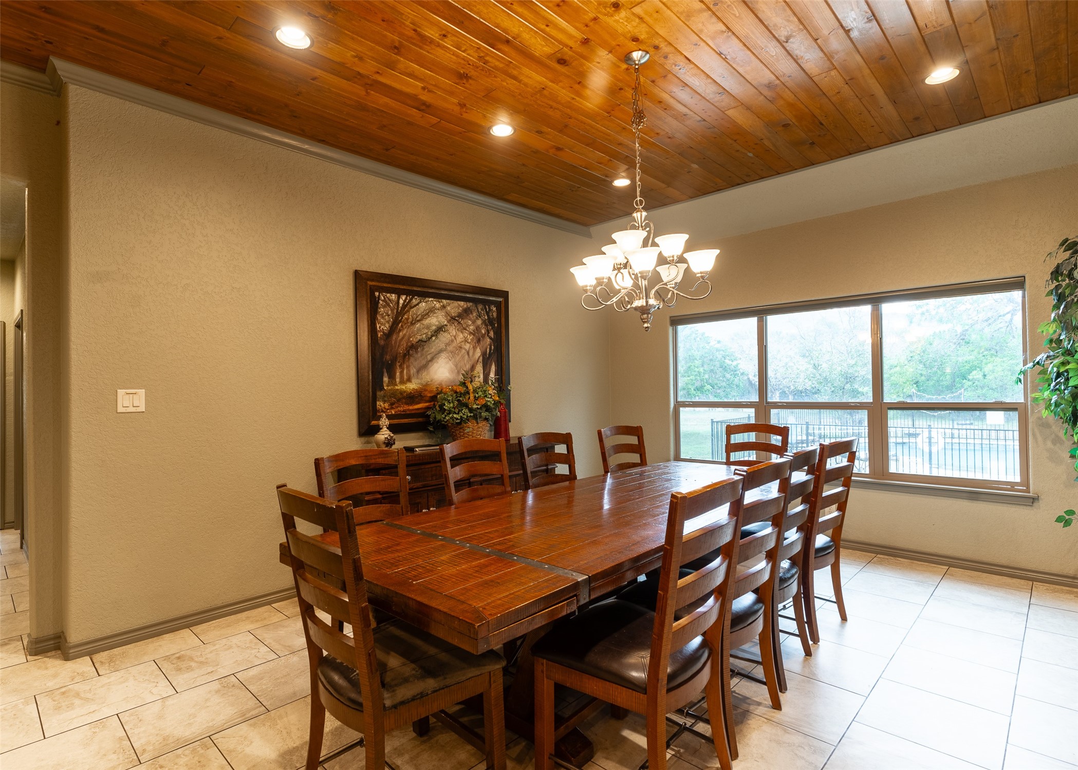 72 Stepping Stone Lane Concan, TX 78838 - Photo 8 of 25 a dining room with furniture a chandelier and window