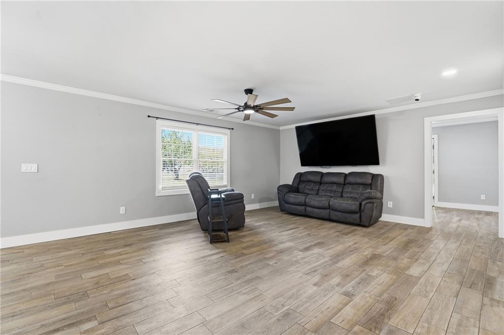 1625 Lake Road Hiram, GA 30141 - Photo 11 of 58 a living room with furniture and a flat screen tv