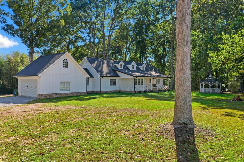 1625 Lake Road Hiram, GA 30141 - Photo 2 of 58 a front view of house with yard and green space