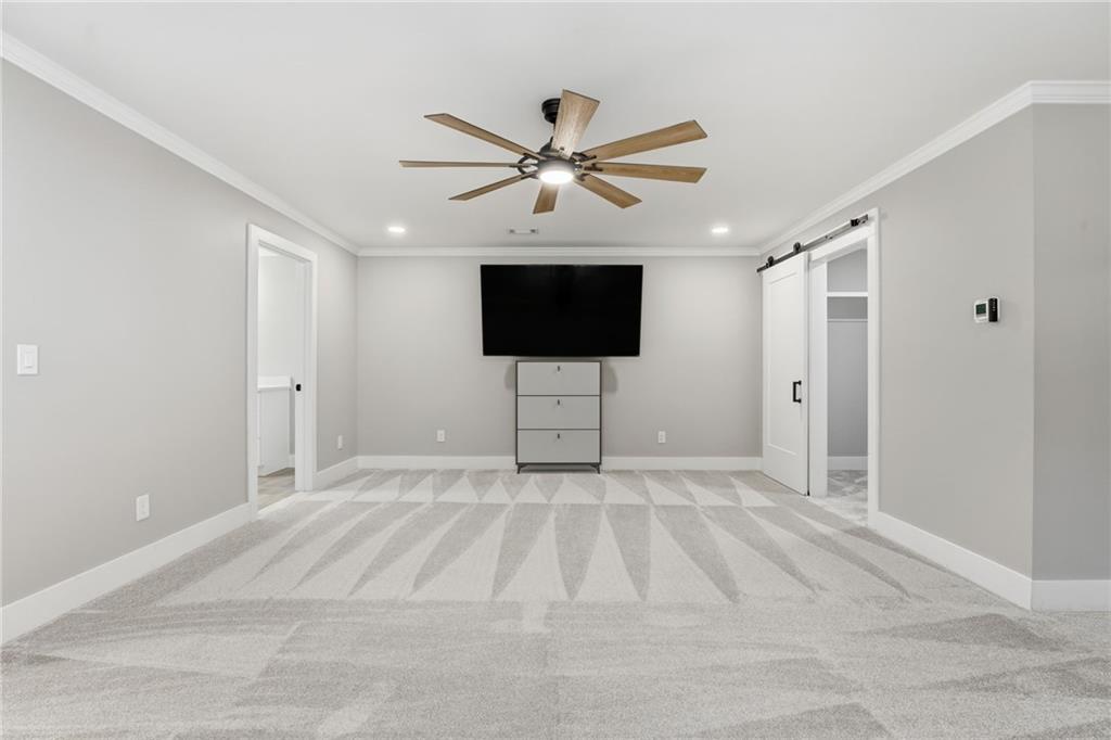 1625 Lake Road Hiram, GA 30141 - Photo 35 of 58 a view of an empty room with a ceiling fan and window