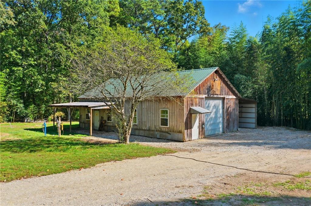 1625 Lake Road Hiram, GA 30141 - Photo 53 of 58 front view of a house with a yard