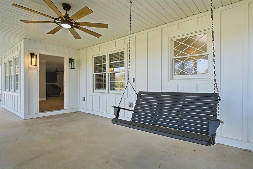 1625 Lake Road Hiram, GA 30141 - Photo 6 of 58 an empty room with windows and fan