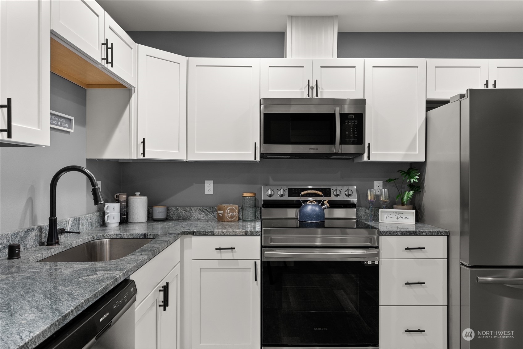 2915 Jackson Highway, Unit A Chehalis, WA 98532 - Photo 12 of 30 a kitchen with stainless steel appliances granite countertop a sink stove and refrigerator