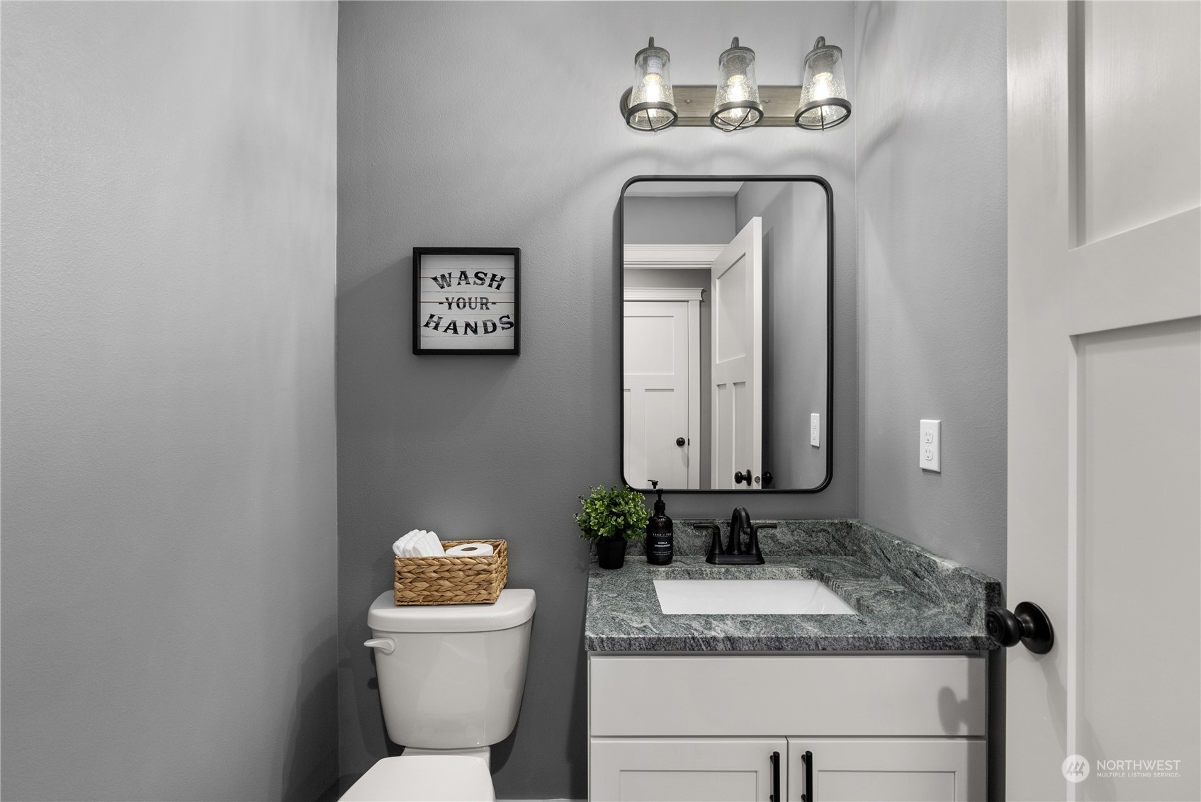2915 Jackson Highway, Unit A Chehalis, WA 98532 - Photo 17 of 30 a bathroom with a granite countertop sink mirror and toilet