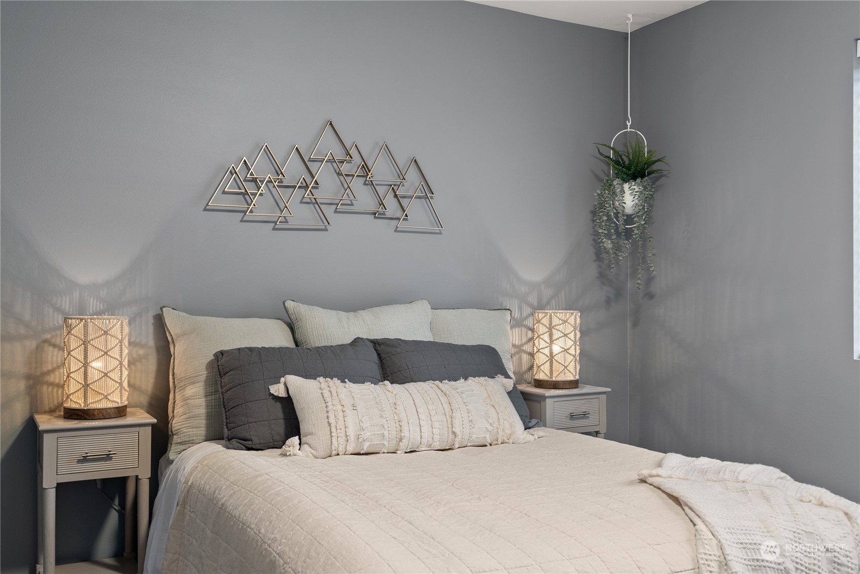 2915 Jackson Highway, Unit A Chehalis, WA 98532 - Photo 20 of 30 a bedroom with a large bed and a chandelier