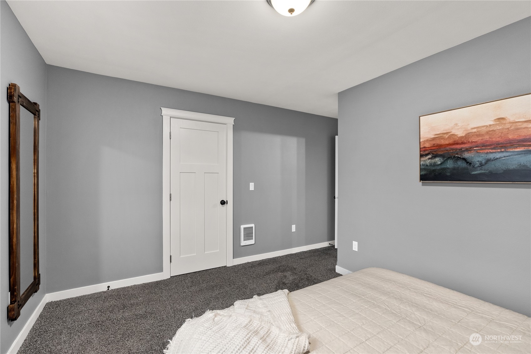 2915 Jackson Highway, Unit A Chehalis, WA 98532 - Photo 21 of 30 a bedroom with a bed and a flat screen tv