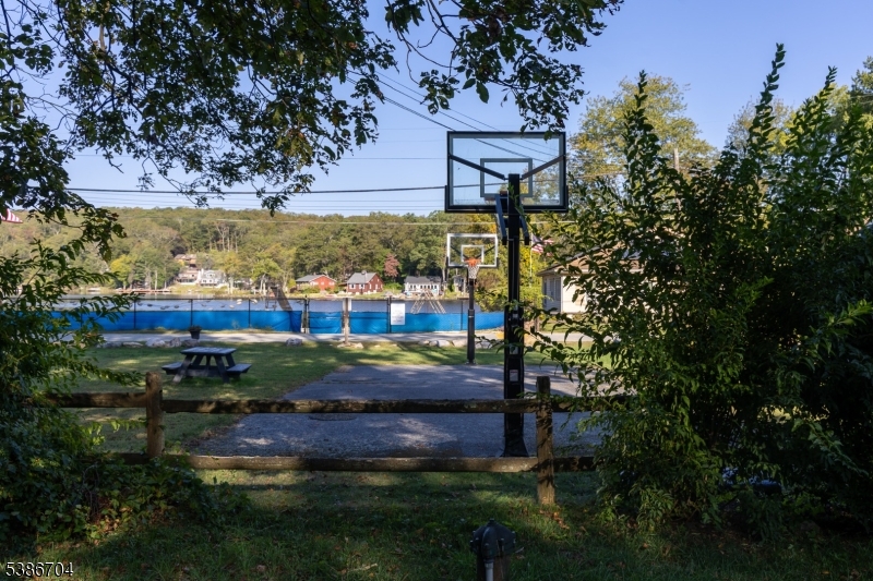 4 Lake Path 1 Road Branchville, NJ 07826 - Photo 4 of 16 a view of a yard with plants