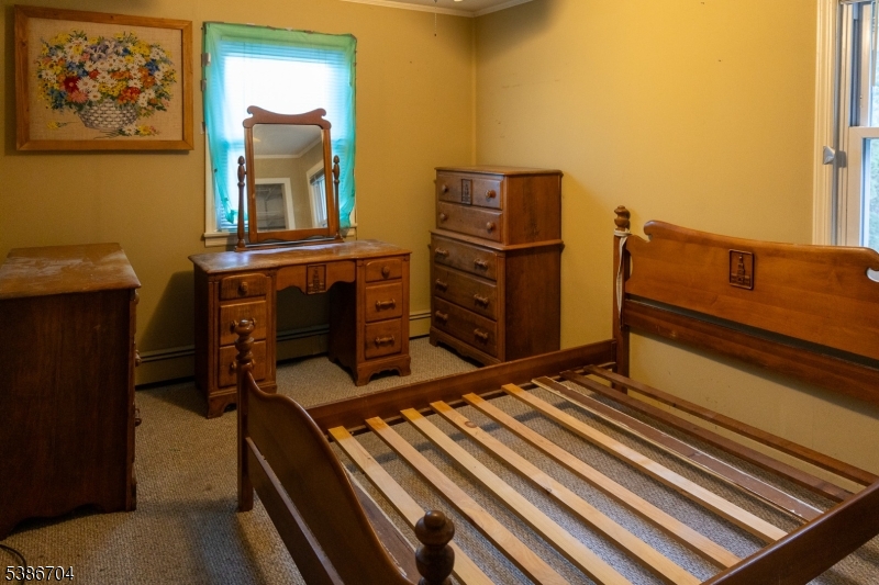 4 Lake Path 1 Road Branchville, NJ 07826 - Photo 6 of 16 a view of a hardwood floor and wardrobe