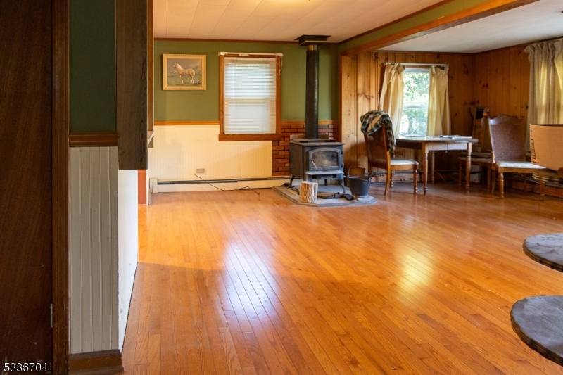 4 Lake Path 1 Road Branchville, NJ 07826 - Photo 8 of 16 a view of a workspace with wooden floor and a window