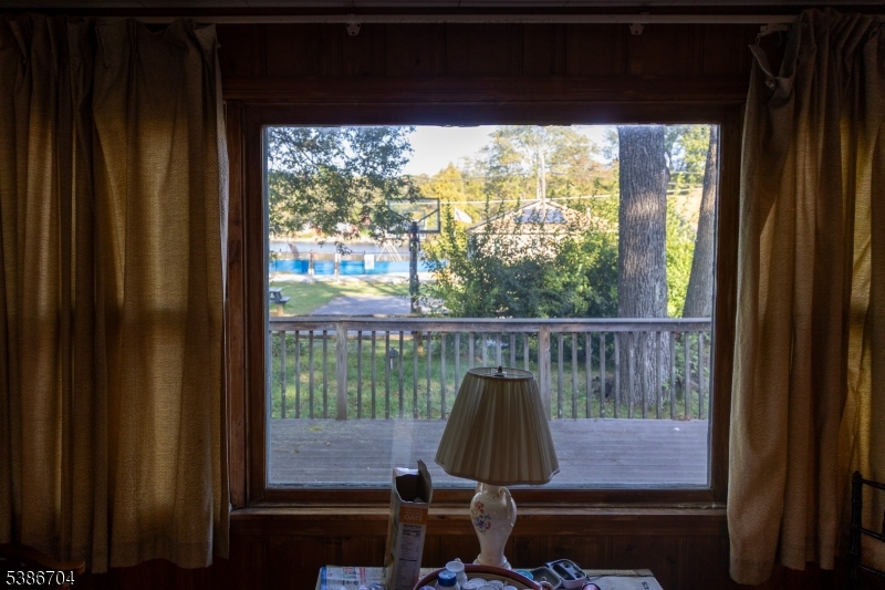 4 Lake Path 1 Road Branchville, NJ 07826 - Photo 9 of 16 a view of a balcony with a garden