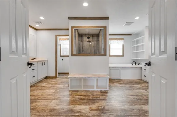 a living room with granite countertop furniture and a fireplace