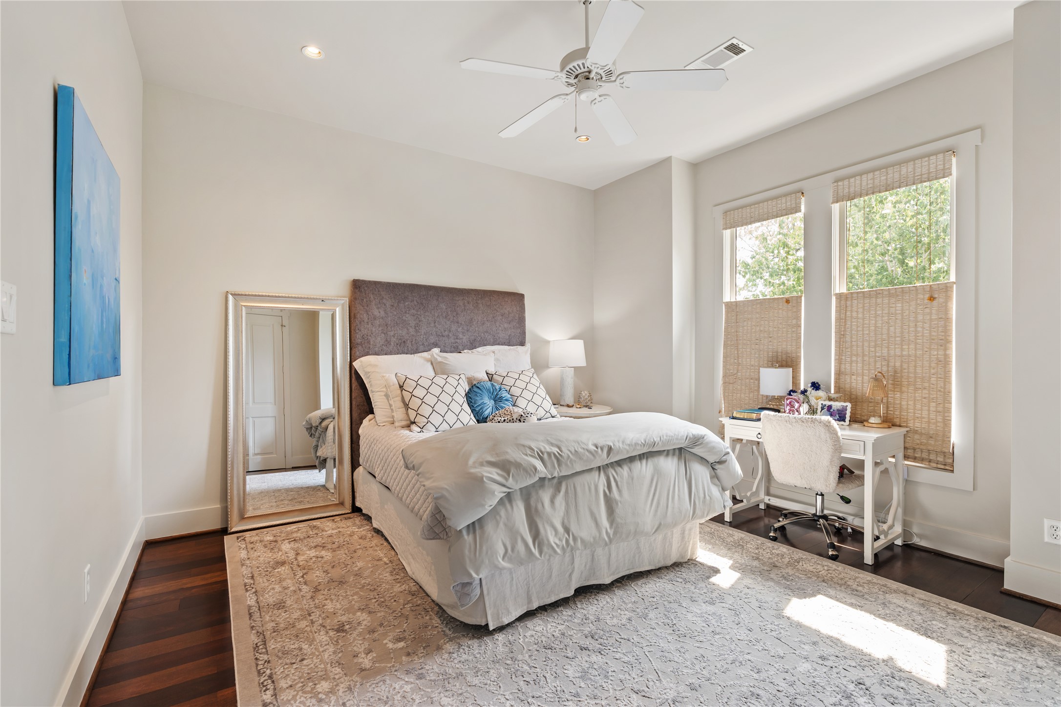 926 Nicholson Street Houston, TX 77008 - Photo 24 of 36 Bright and inviting secondary bedroom with hardwood floors, oversized windows, and generous proportions.