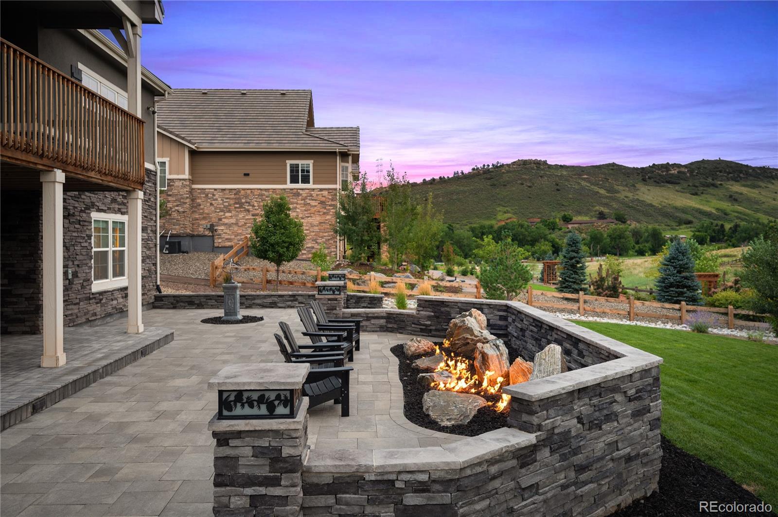 14916 Lyons Ridge Drive Morrison, CO 80465 - Photo 19 of 29 a view of a swimming pool with a patio