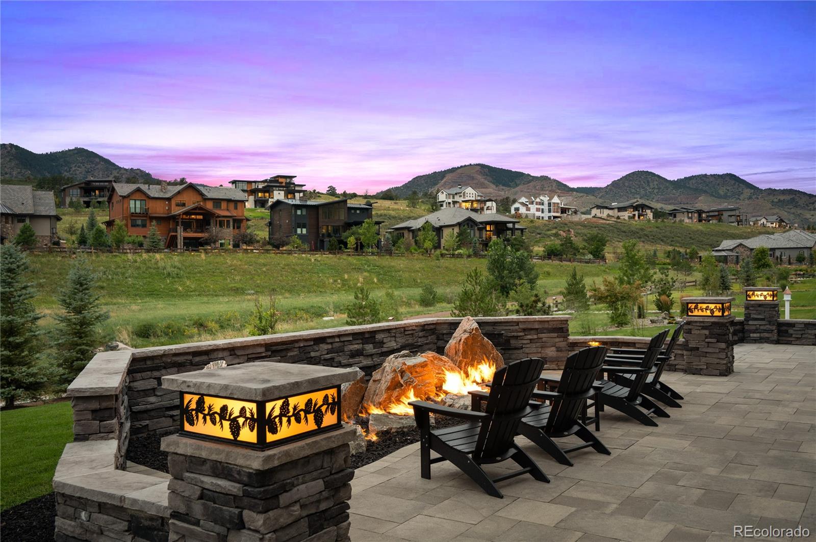14916 Lyons Ridge Drive Morrison, CO 80465 - Photo 23 of 29 a view of a chairs and table on the terrace