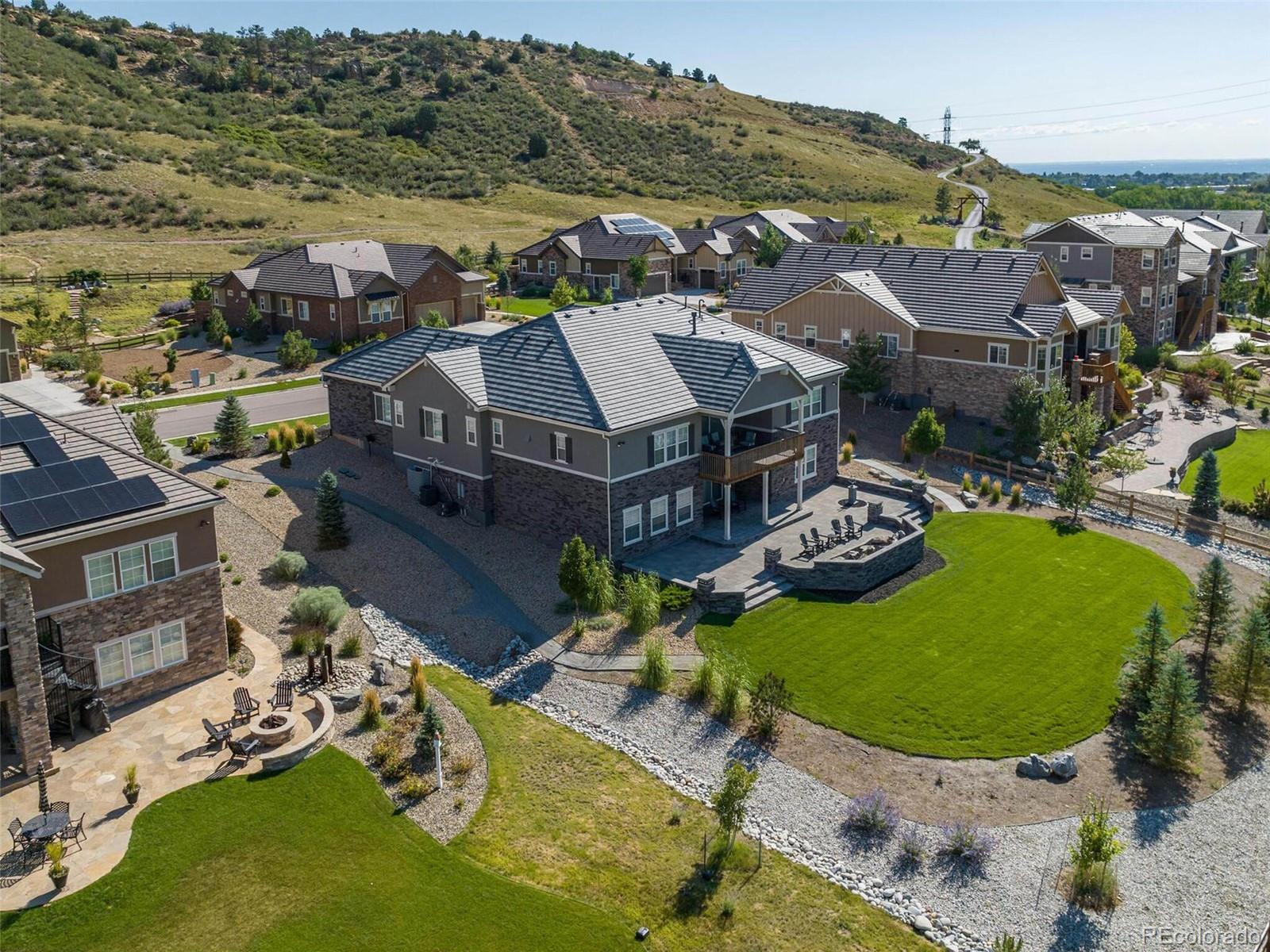 14916 Lyons Ridge Drive Morrison, CO 80465 - Photo 3 of 29 an aerial view of a house with a big yard