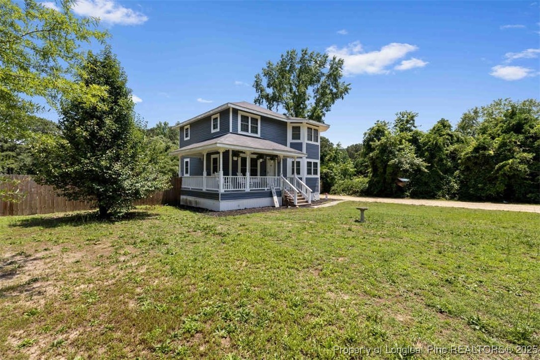 2040 Page Road Stedman, NC 28391 - Photo 28 of 33 a front view of a house with a yard