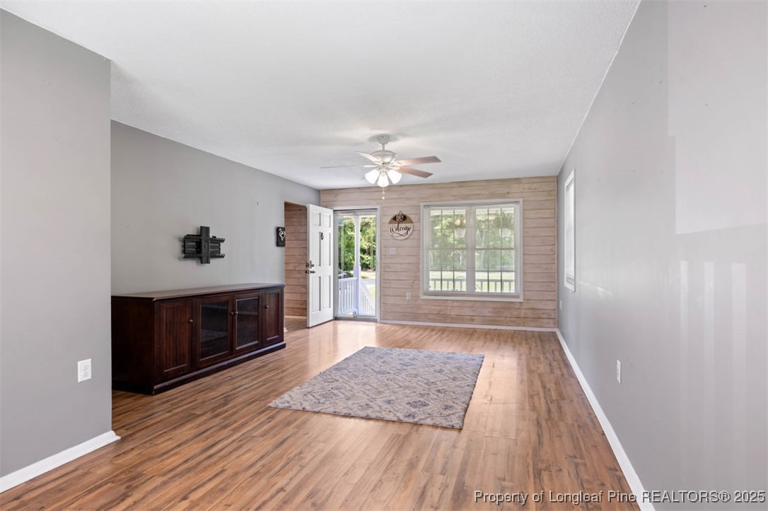 2040 Page Road Stedman, NC 28391 - Photo 4 of 33 a bedroom with a bed and a fireplace