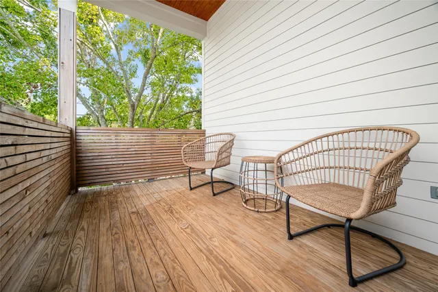 a view of a balcony with chair