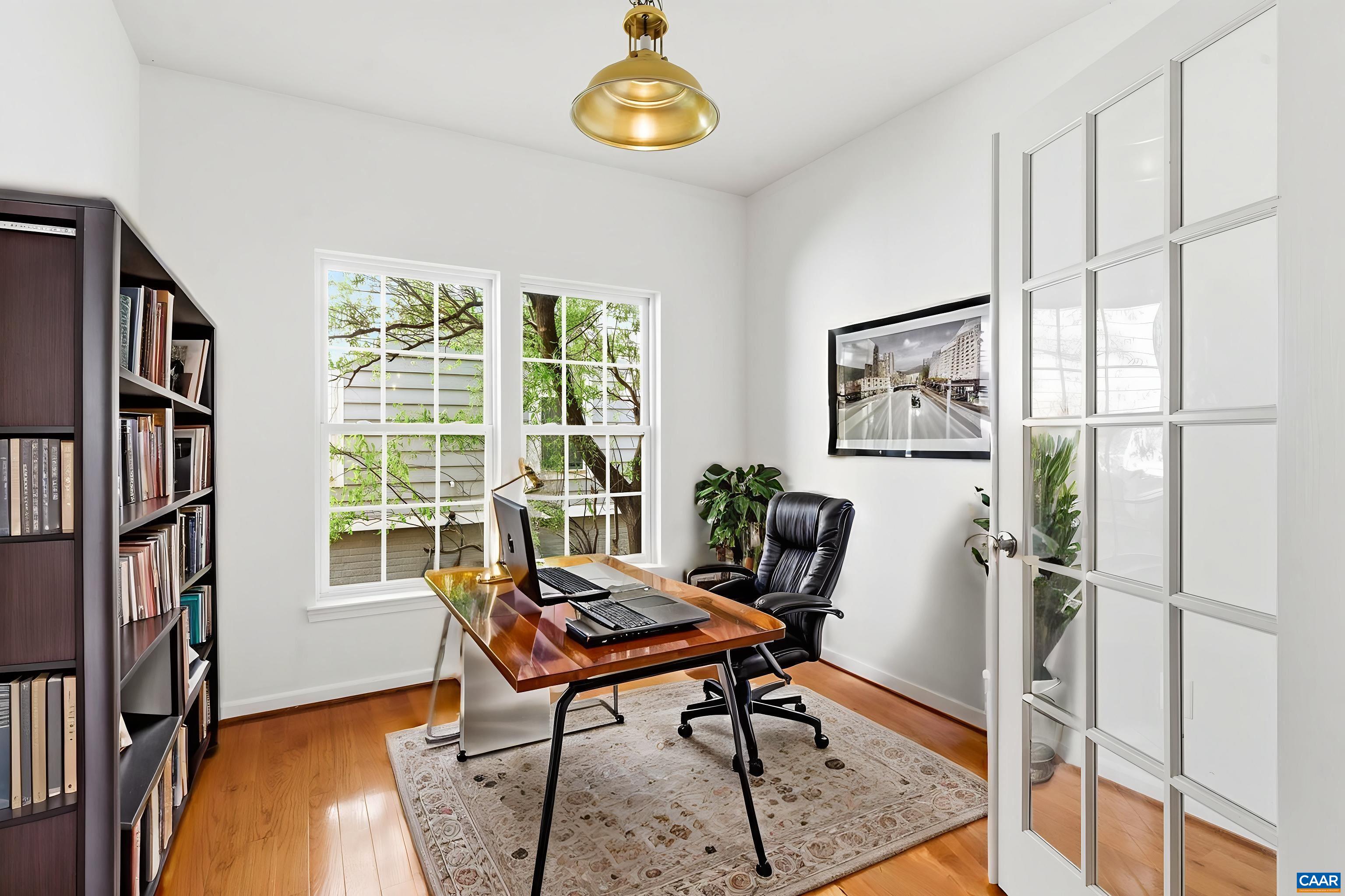 700 Rainier Road Charlottesville, VA 22903 - Photo 15 of 41 Private office space with hardwood floors and natural light, ideal for remote work or study. Virtually Staged.