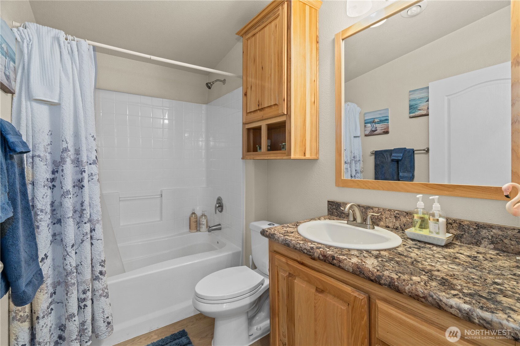 132 River Park Road Forks, WA 98331 - Photo 24 of 40 a bathroom with a granite countertop sink toilet and shower