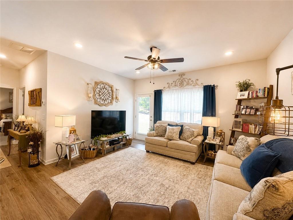 53 Bennett Way Rome, GA 30161 - Photo 12 of 42 a living room with furniture and a flat screen tv