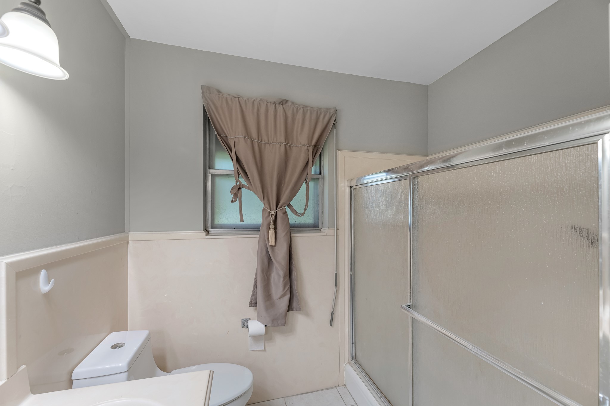 1109 Becker Street Channelview, TX 77530 - Photo 17 of 43 a bathroom with a toilet and a shower