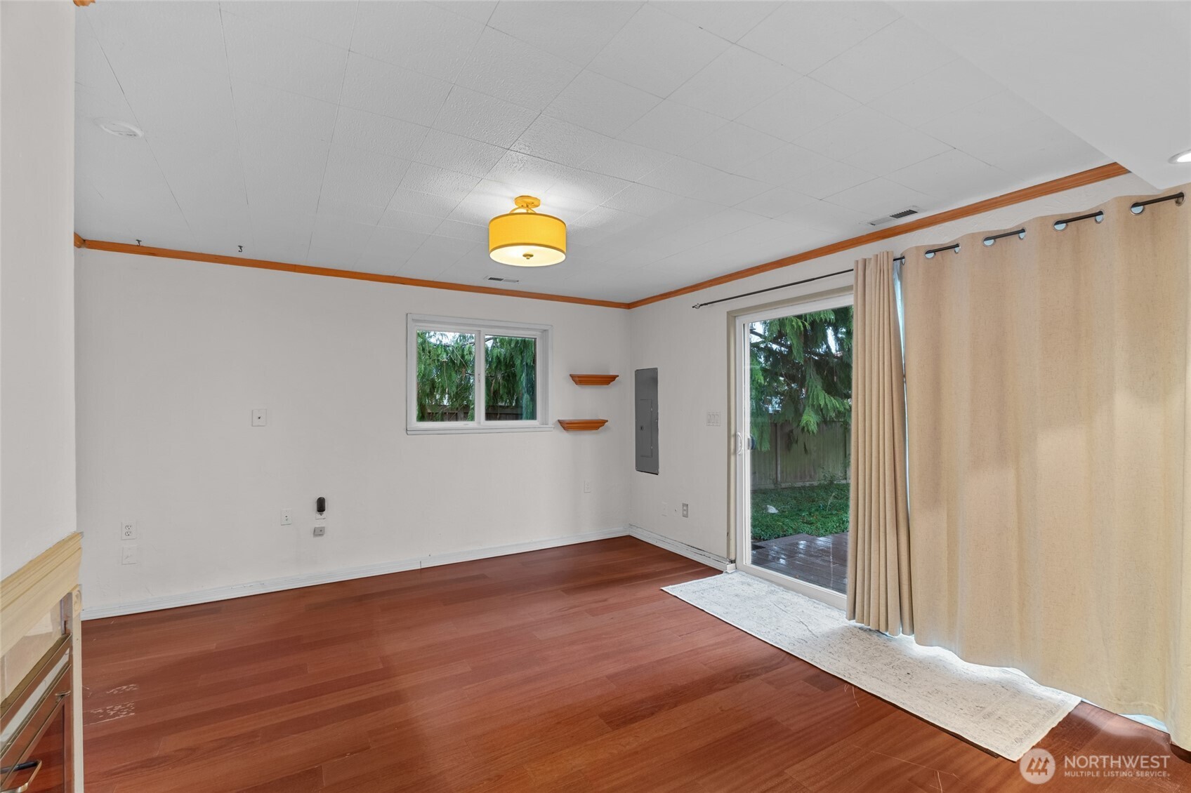 1306 Southwest 160th Street Burien, WA 98166 - Photo 13 of 29 a view of a wooden floor and a window