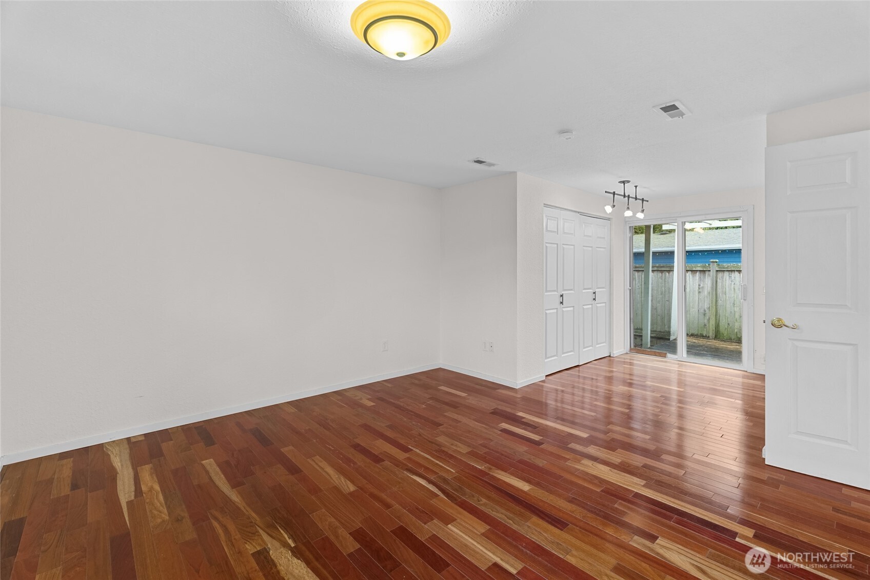 1306 Southwest 160th Street Burien, WA 98166 - Photo 14 of 29 a view of empty room with wooden floor
