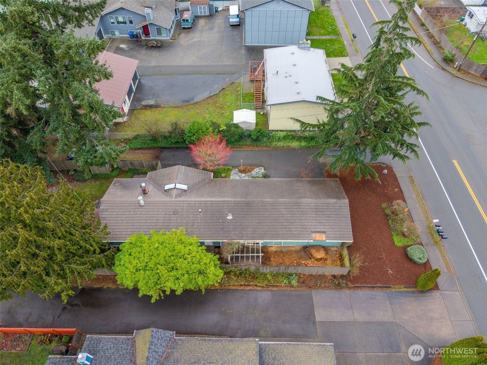 1306 Southwest 160th Street Burien, WA 98166 - Photo 27 of 29 an aerial view of a house with a garden and yard
