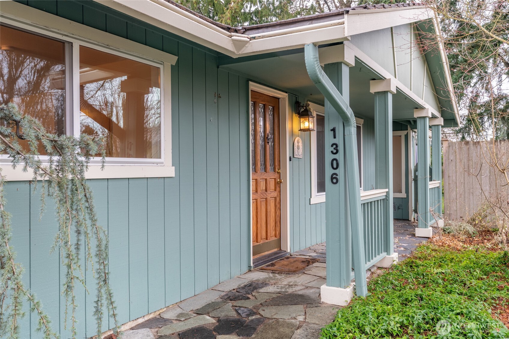 1306 Southwest 160th Street Burien, WA 98166 - Photo 29 of 29 a front view of a house with a porch