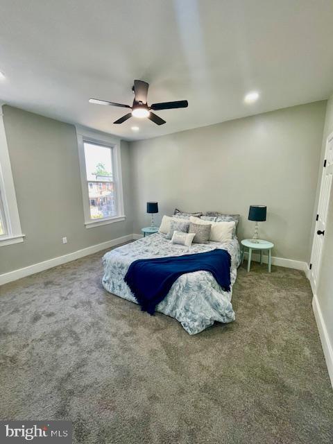 4041 West Cold Spring Lane Baltimore, MD 21215 - Photo 19 of 37 a spacious bedroom with a bed and a window