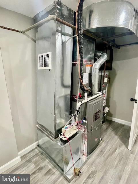 4041 West Cold Spring Lane Baltimore, MD 21215 - Photo 30 of 37 a room with gym equipment