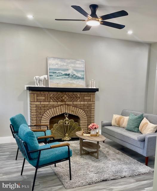 4041 West Cold Spring Lane Baltimore, MD 21215 - Photo 3 of 37 a living room with furniture and a fireplace