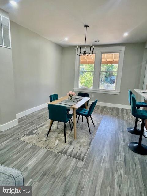 4041 West Cold Spring Lane Baltimore, MD 21215 - Photo 5 of 37 a workspace with furniture window and wooden floor