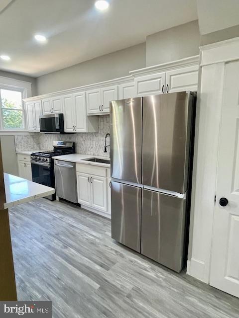4041 West Cold Spring Lane Baltimore, MD 21215 - Photo 8 of 37 a kitchen with stainless steel appliances a refrigerator sink and microwave