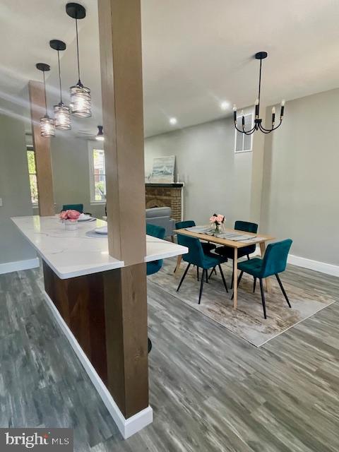 4041 West Cold Spring Lane Baltimore, MD 21215 - Photo 9 of 37 a view of a dining room with furniture and wooden floor