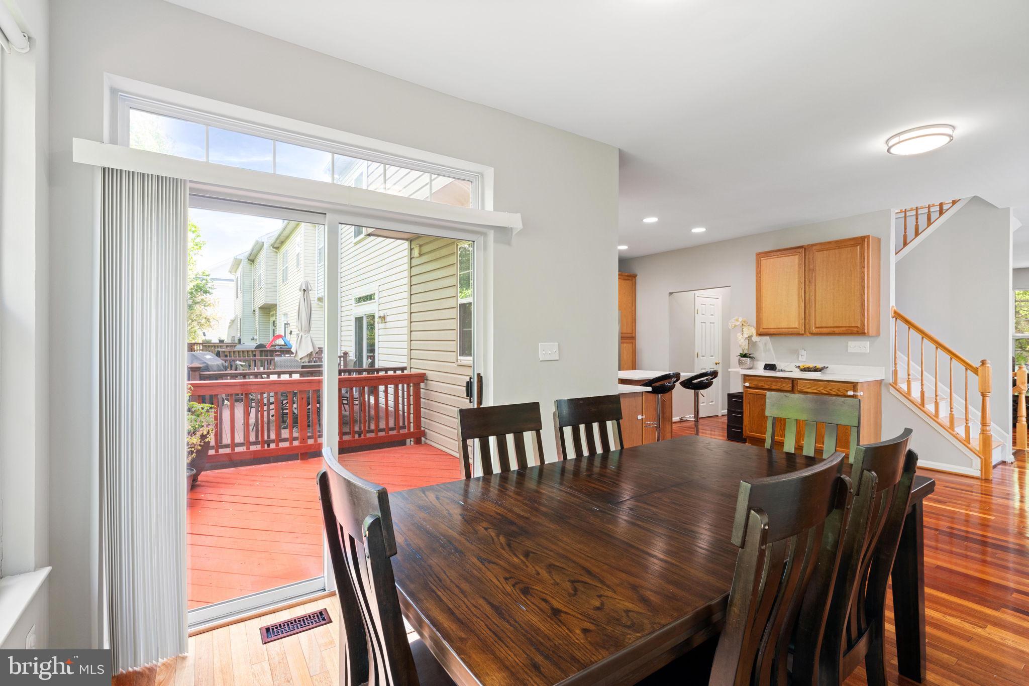 21654 Frame Square Broadlands, VA 20148 - Photo 14 of 43 Bright dining area with outdoor access.