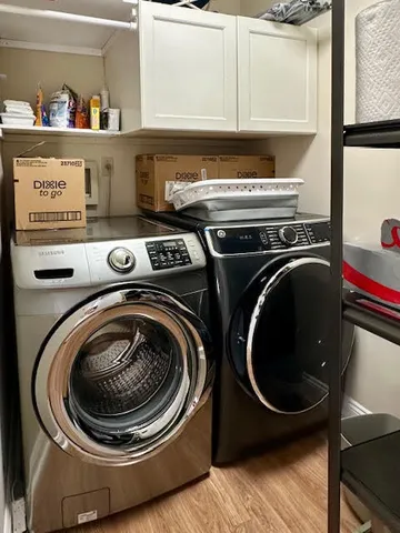 a utility room with dryer and washer