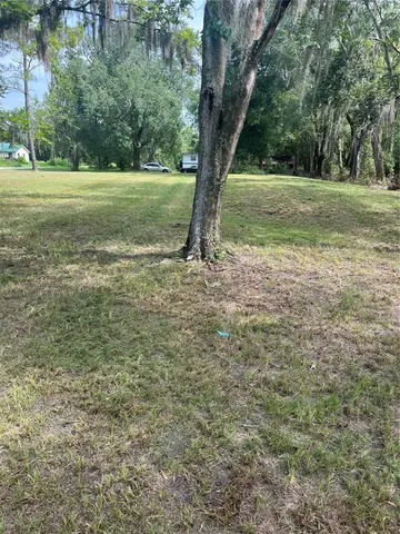 a view of outdoor space and yard