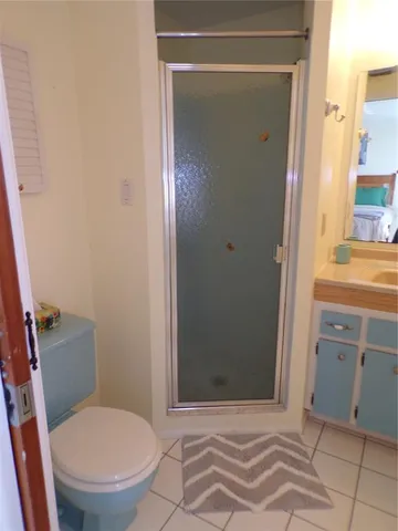a bathroom with a toilet and a sink